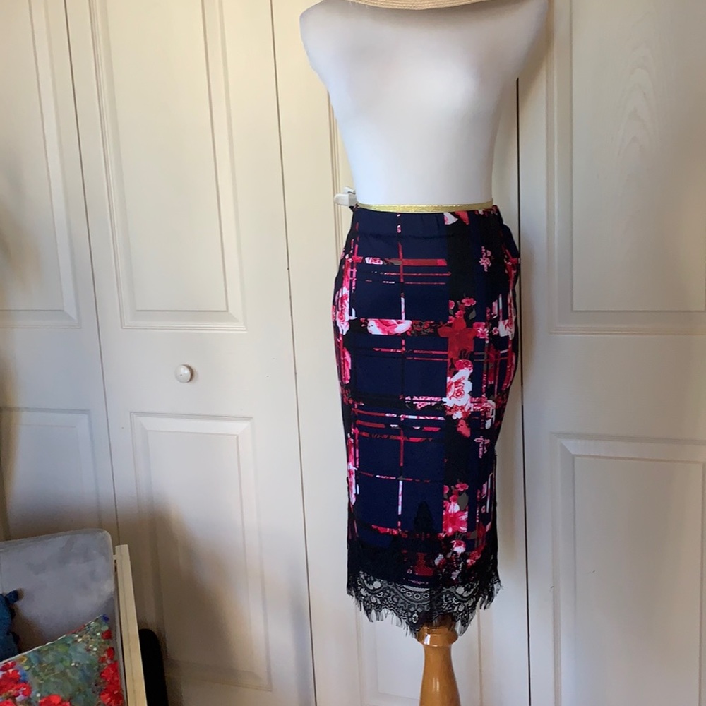Bisou Bisou small skirt with stretch. Blue, pink, black lace trim. 22”-25”.